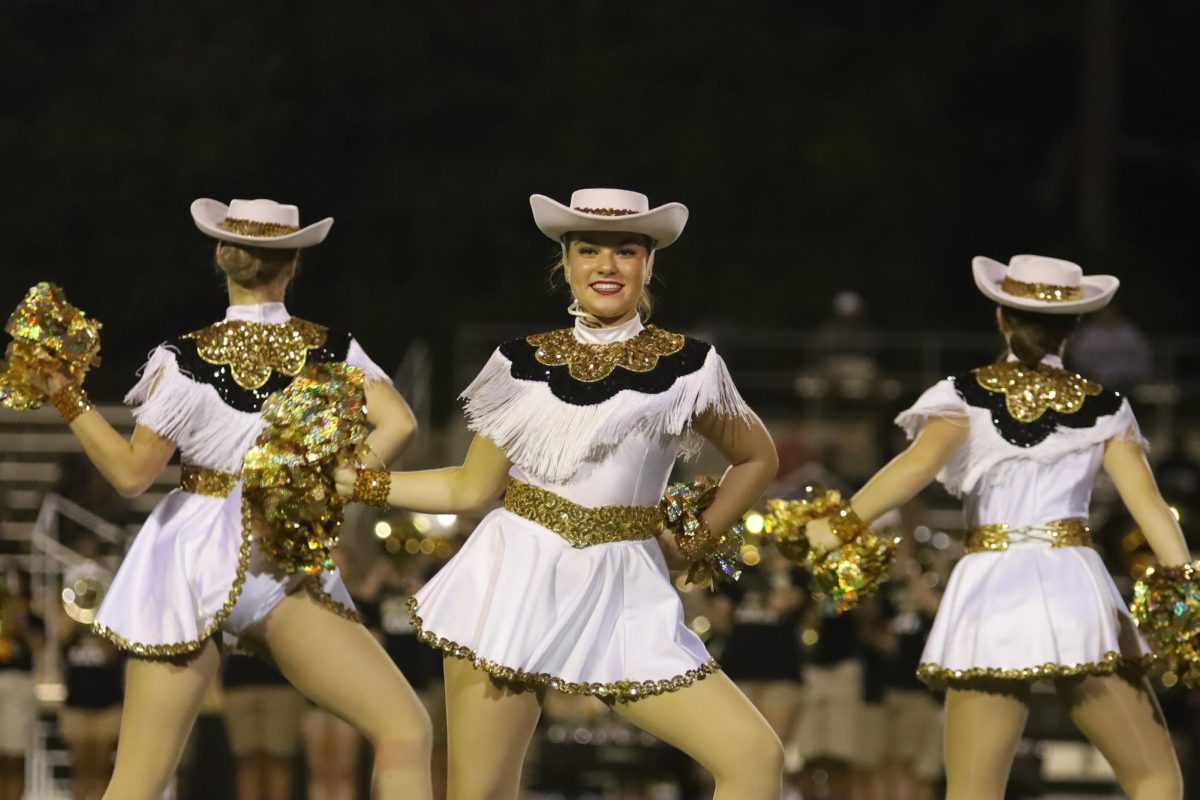 Senior Blakely Duke performs at the halftime show against Fresco Memorial 