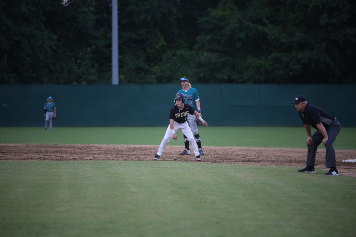 In round two of the playoffs, against Carrollton, Jace Elrod (10) leads off the second base preparing to steal third base. 