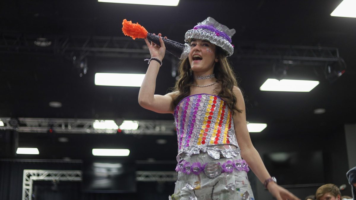 Walking the runway, Chloe Hebert (12), one of the show's models, wore a recycled outfit made by students from the Best Day Ever Show.